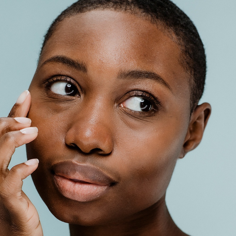 Close up of a black woman with big brown eyes