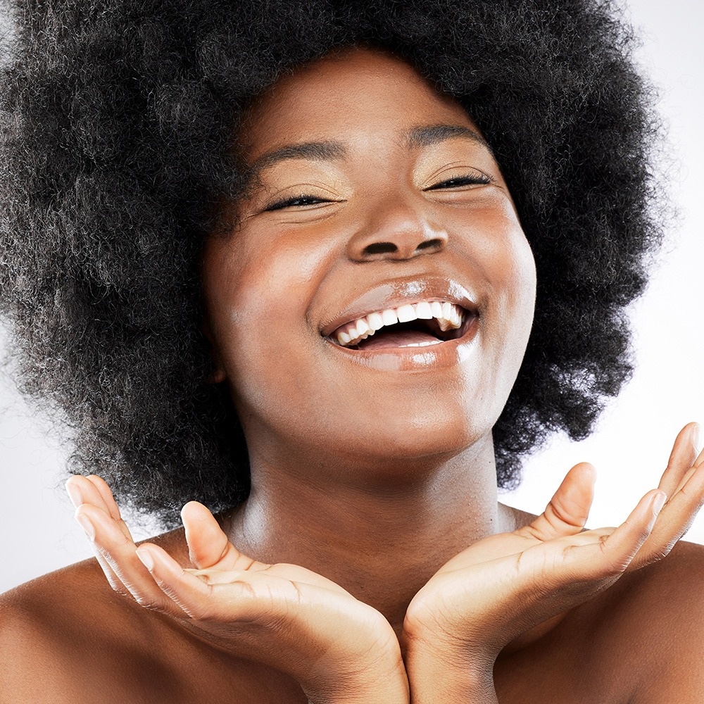 Black woman with a happy glowy face